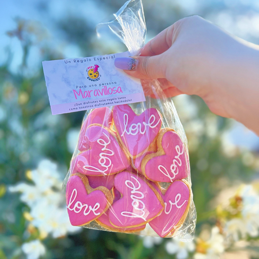 BOLSA 12 MINI GALLETAS CORAZONES LOVE ROSADOS